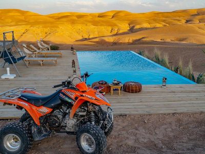 Agafay desert activities: Relax and indulge in a refreshing swim while enjoying a delicious lunch in the Agafay Desert