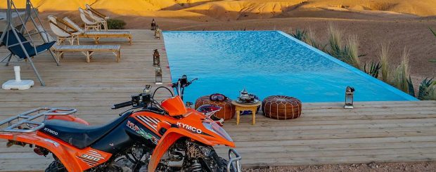 Agafay desert activities: Relax and indulge in a refreshing swim while enjoying a delicious lunch in the Agafay Desert